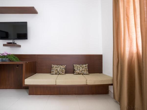 Sanctum Suites BEL Road Bangalore : photo 2 de la chambre chambre lit king-size premium