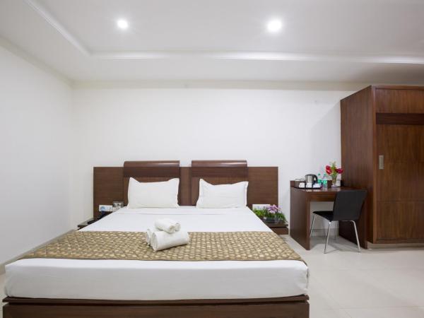 Sanctum Suites BEL Road Bangalore : photo 1 de la chambre chambre lit king-size standard