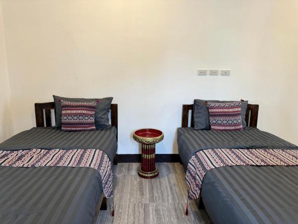 Proud Chiang Mai Poshtel : photo 2 de la chambre chambre double ou lits jumeaux deluxe – vue sur jardin