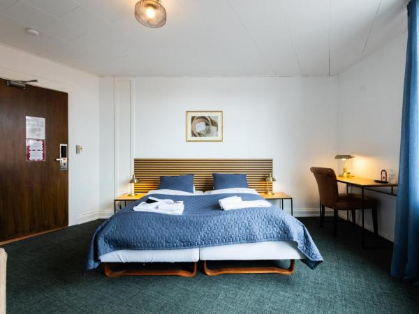 Milling Hotel Windsor : photo 5 de la chambre chambre double ou lits jumeaux avec lit d'appoint