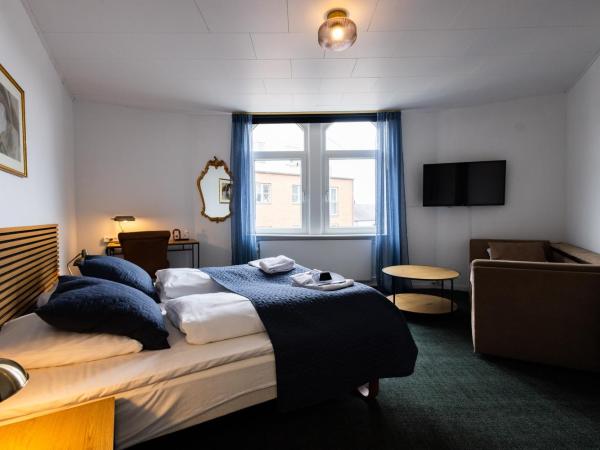 Milling Hotel Windsor : photo 1 de la chambre chambre double ou lits jumeaux avec lit d'appoint