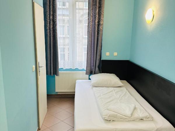 Angel Hotel : photo 2 de la chambre chambre simple