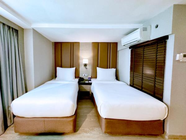 Ramada by Wyndham Bangkok Sukhumvit 11 : photo 2 de la chambre chambre deluxe avec 2 lits simples - non-fumeurs