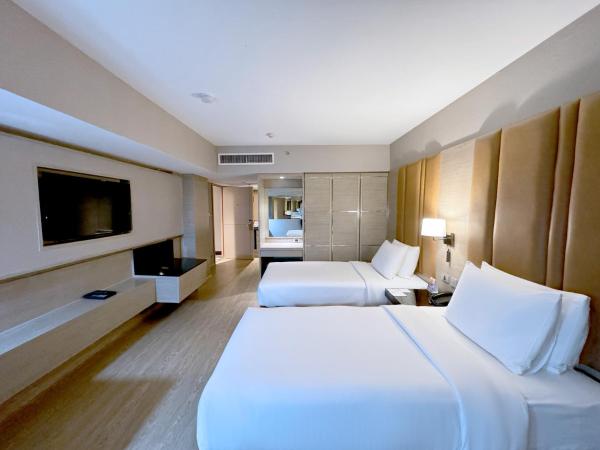 Ramada by Wyndham Bangkok Sukhumvit 11 : photo 3 de la chambre grande chambre deluxe avec 2 lits simples sans fenêtre - non-fumeurs
