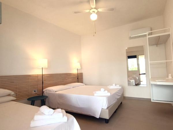 Lido Di Alghero Rooms on the Beach : photo 4 de la chambre chambre triple standard - vue sur mer