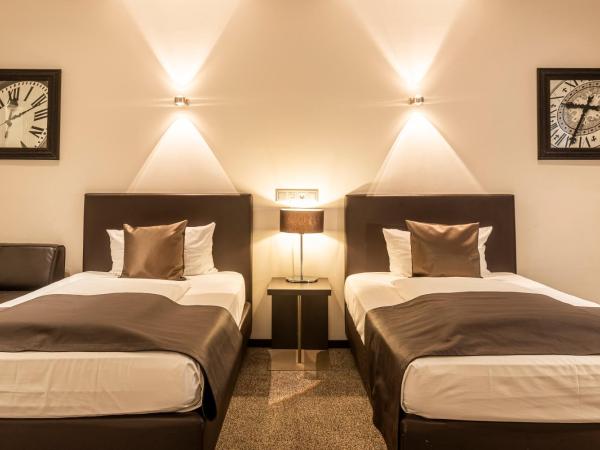 Mauritius Hotel & Therme : photo 6 de la chambre chambre quadruple