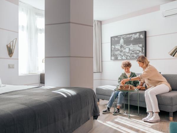 Pestana Lisboa Vintage City Center Suites : photo 3 de la chambre chambre double ou lits jumeaux supérieure