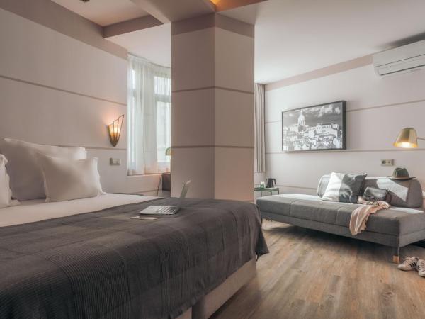 Pestana Lisboa Vintage City Center Suites : photo 1 de la chambre chambre double ou lits jumeaux supérieure