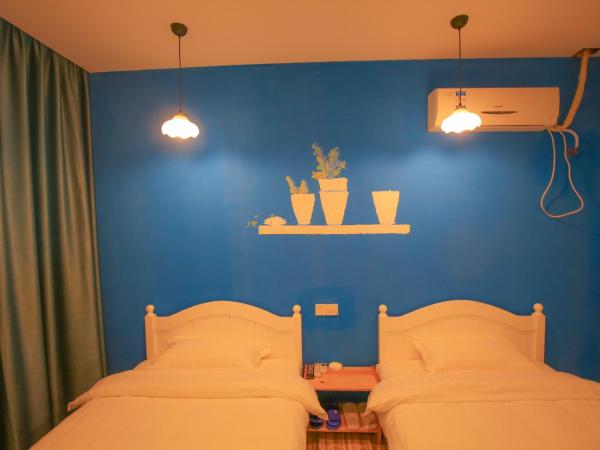 Ningbo 238 International Youth Hostel : photo 4 de la chambre chambre lits jumeaux