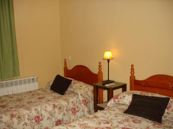 Hostal Puerta Bonita Vista Alegre : photo 7 de la chambre chambre double ou lits jumeaux