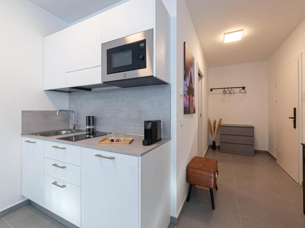 Grazora Living Apartments : photo 3 de la chambre chambre lit king-size supérieure