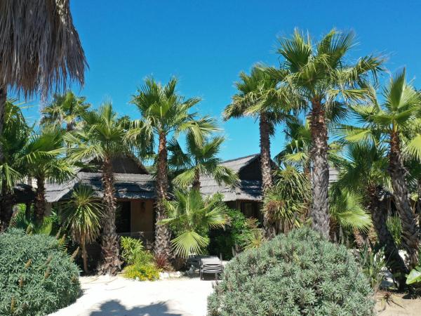 Kon Tiki : photo 6 de la chambre hutte tiki jardin premium - bungalow 2 chambres (4 adultes + 2 enfants)