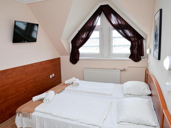Major Panzió és Étterem : photo 8 de la chambre chambre double