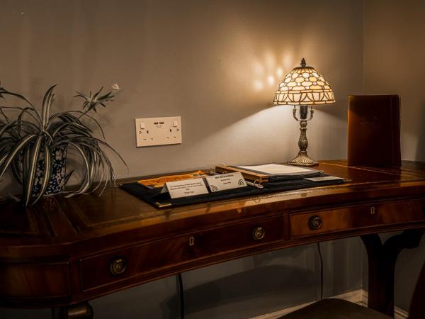 The Alamo Guest House : photo 4 de la chambre hébergement lit king-size classique