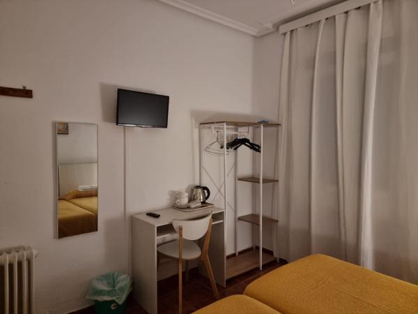 Casa de Huéspedes Cuenca : photo 1 de la chambre chambre lits jumeaux avec salle de bains commune