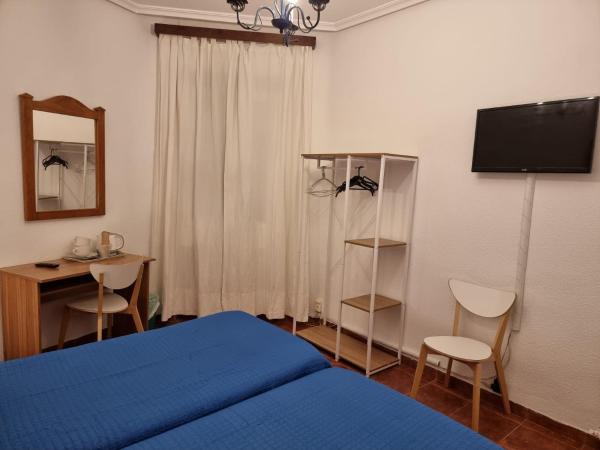 Casa de Huéspedes Cuenca : photo 2 de la chambre chambre lits jumeaux avec salle de bains commune