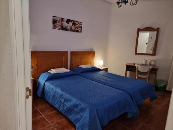Casa de Huéspedes Cuenca : photo 3 de la chambre chambre lits jumeaux avec salle de bains commune