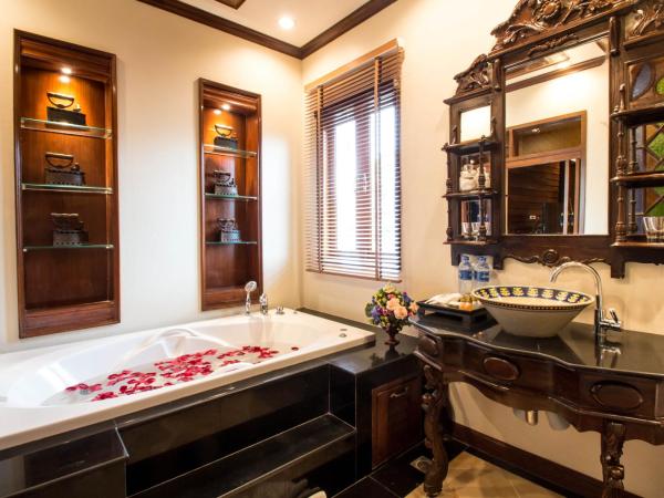 Villa Sirilanna Hotel : photo 2 de la chambre lanna deluxe suite king bed with spa bath (no balcony, no window)