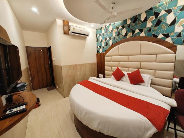 Hotel Dream Palace Residency - Near LBS Marg Kural West : photo 2 de la chambre suite