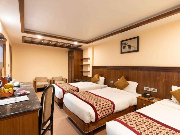 Hotel Manang : photo 4 de la chambre chambre triple supérieure