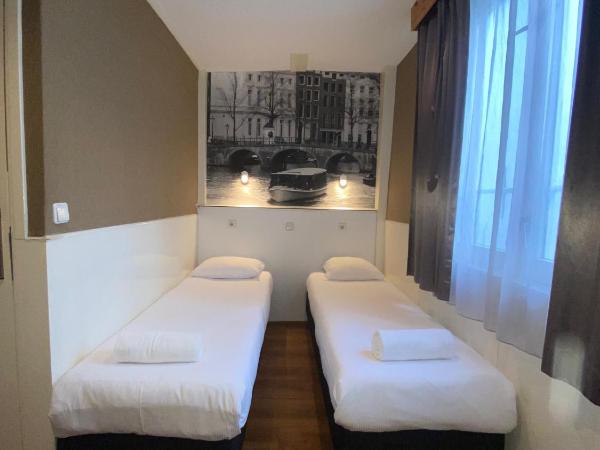 Hotel Old Quarter : photo 8 de la chambre chambre double ou lits jumeaux avec salle de bains privative