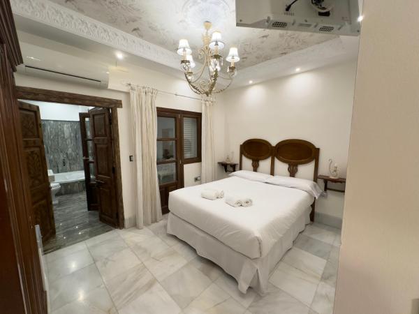 Suite Comares : photo 3 de la chambre chambre double de luxe avec baignoire spa 