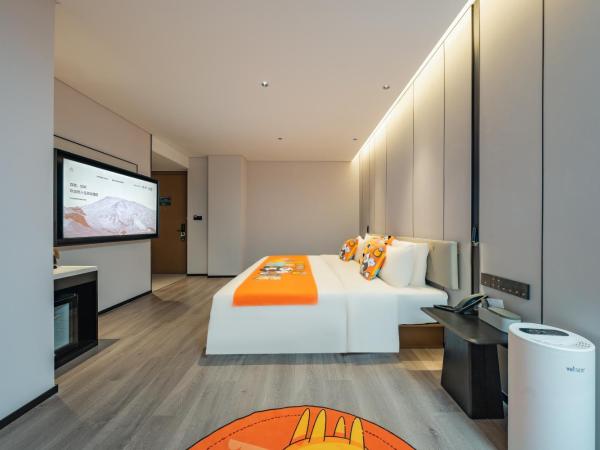 广州琶洲会展中心亚朵酒店-广交会期间免费穿梭巴士 : photo 4 de la chambre chambre familiale jimu