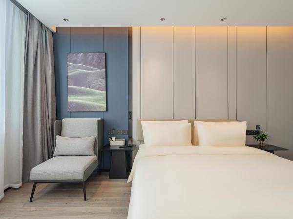 广州琶洲会展中心亚朵酒店-广交会期间免费穿梭巴士 : photo 3 de la chambre jimu double room with city view