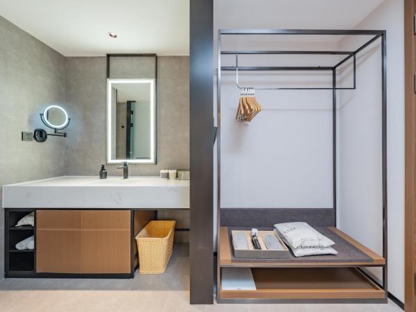 广州琶洲会展中心亚朵酒店-广交会期间免费穿梭巴士 : photo 3 de la chambre chambre lits jumeaux exécutive