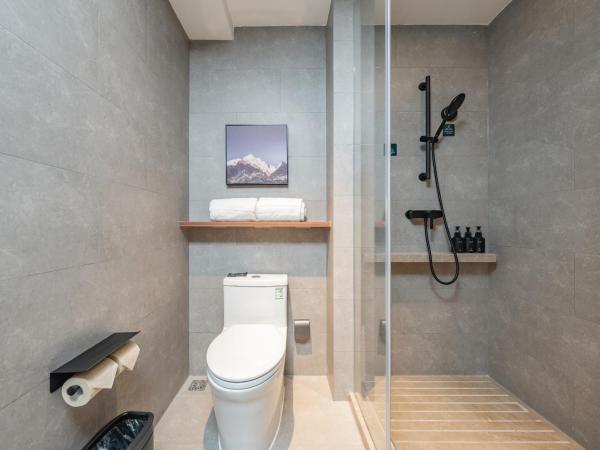 广州琶洲会展中心亚朵酒店-广交会期间免费穿梭巴士 : photo 2 de la chambre chambre lits jumeaux exécutive