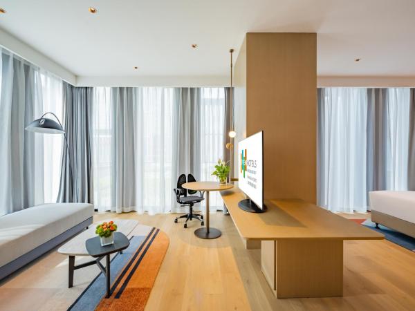 EVEN Hotels Shanghai Expo, an IHG Hotel : photo 2 de la chambre suite 1 chambre lit king-size