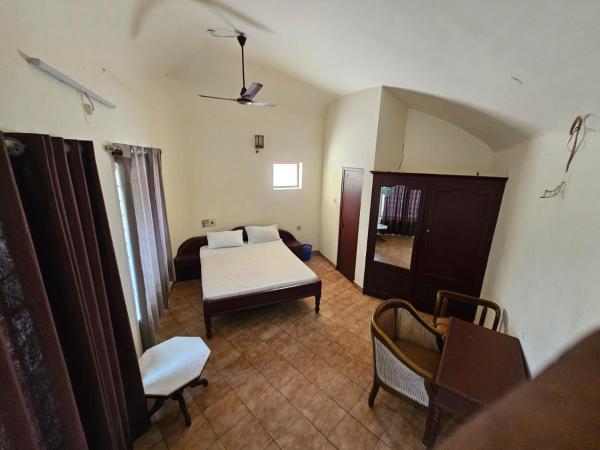 Baywatch Beach Homes : photo 1 de la chambre chambre double standard avec ventilateur