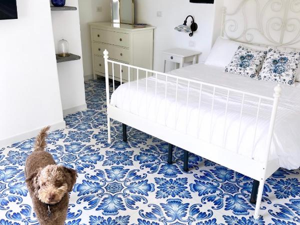 Suite Villa Carolina : photo 3 de la chambre chambre double - vue sur jardin