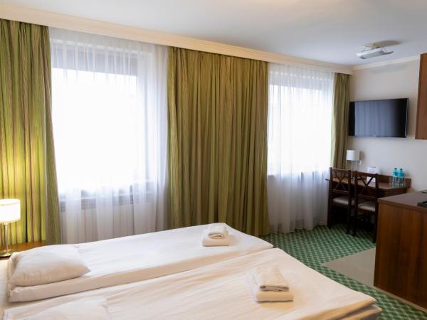 Hit Hotel : photo 2 de la chambre comfort studio with a/c and kitchenette