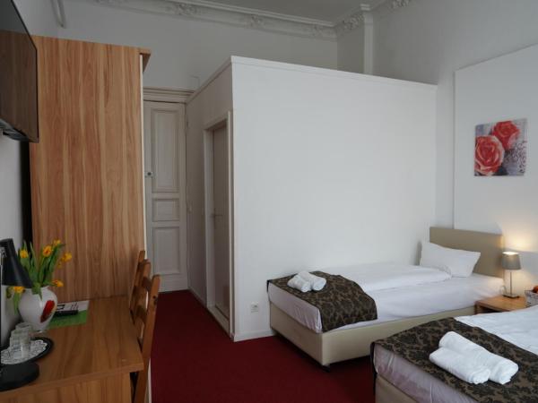 City Pension Berlin : photo 3 de la chambre chambre triple