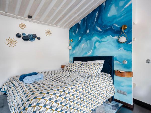 Aux Heures Bleues : photo 1 de la chambre chambre double deluxe avec balcon
