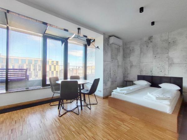 Turnau City Aparthotel : photo 2 de la chambre suite confort avec terrasse