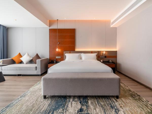 The Puyan Hotel Hangzhou Jiubao : photo 3 de la chambre chambre lit king-size deluxe