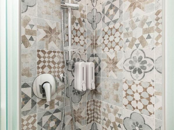 VittorioVeneto126 : photo 7 de la chambre chambre triple avec douche