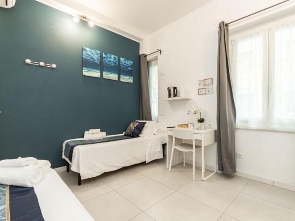 VittorioVeneto126 : photo 4 de la chambre chambre lits jumeaux avec douche 