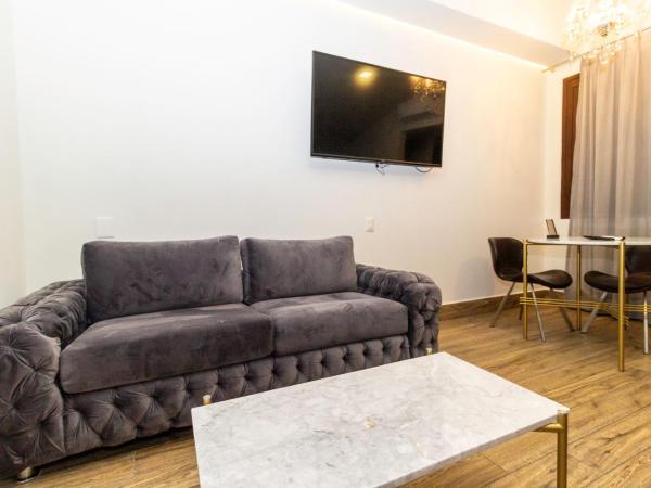 Hotel Boutique Naura Centro : photo 2 de la chambre suite familiale