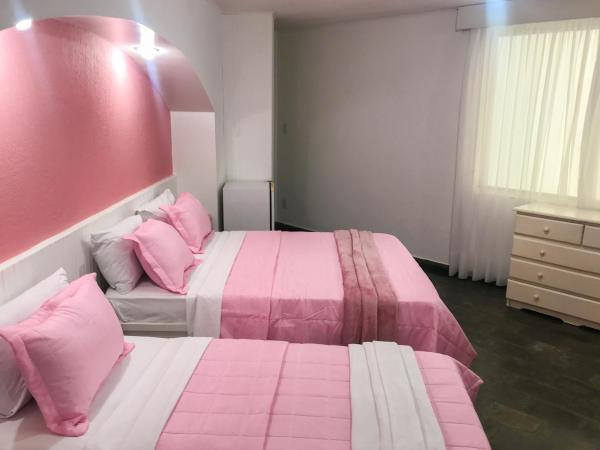 pousada da sarafina ltda : photo 4 de la chambre chambre quadruple