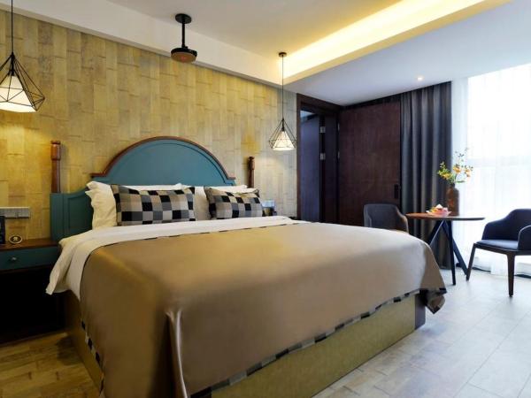 西安大雁塔大唐不夜城美豪雅致酒店 : photo 3 de la chambre deluxe cinema king room