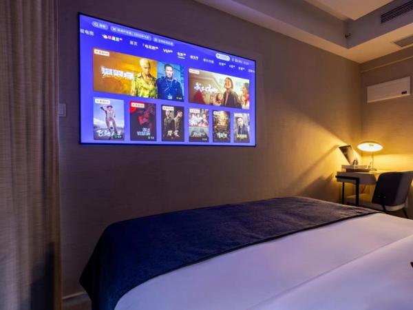 Excellence International Apartment - Convention & Exhibition Center : photo 5 de la chambre chambre lit queen-size deluxe