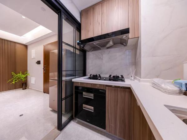 Excellence International Apartment - Convention & Exhibition Center : photo 7 de la chambre suite 2 chambres