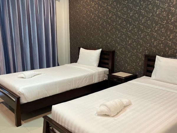 Norrarat Place นรรัตน์ เพลส : photo 3 de la chambre chambre lits jumeaux avec salle de bains privative