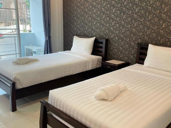 Norrarat Place นรรัตน์ เพลส : photo 2 de la chambre chambre lits jumeaux avec salle de bains privative