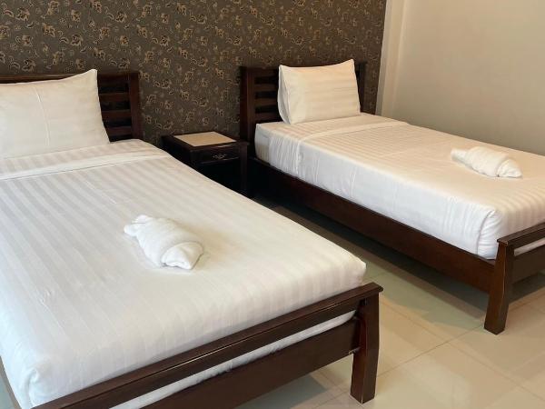 Norrarat Place นรรัตน์ เพลส : photo 1 de la chambre chambre lits jumeaux avec salle de bains privative