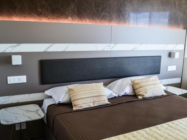 Mediterranea Hotel & Convention Center : photo 1 de la chambre chambre triple