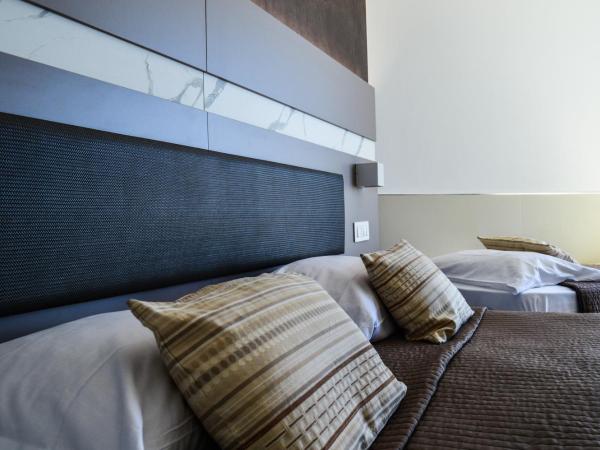 Mediterranea Hotel & Convention Center : photo 5 de la chambre chambre triple